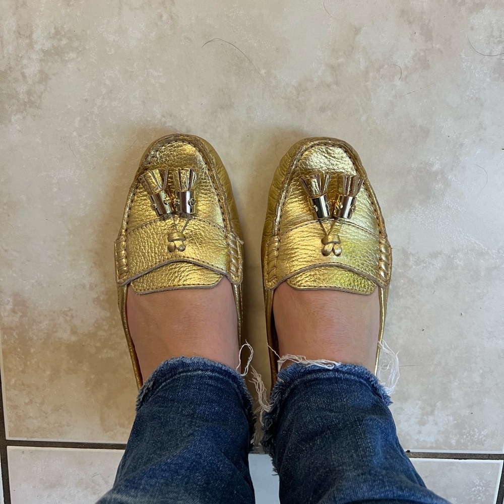 Tory Burch gold shoes size 8.  Runs small
